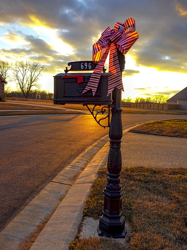mailbox street louisiana bossier sunset bow winter cellphonephotography christmas goldenhour curb neighborhood clouds