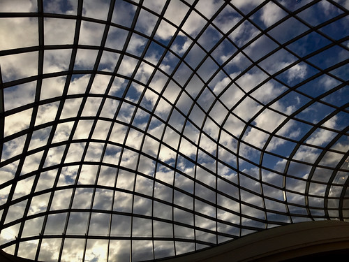 australia melbourne chadstone shoppingcentre mall architecture roof windows atrium building sky clouds reflections grid transparent glass