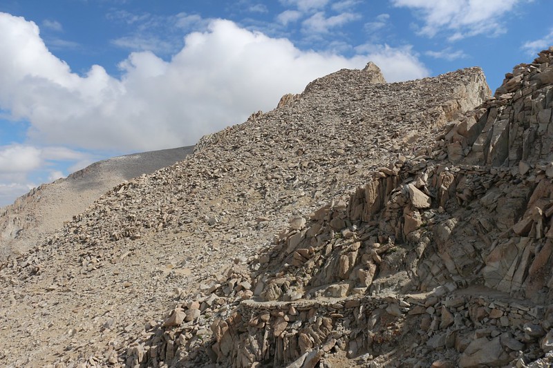 The final 1.9 miles to the summit of Mount Whitney begin at Trail Crest - Mount Muir is the peak to the right