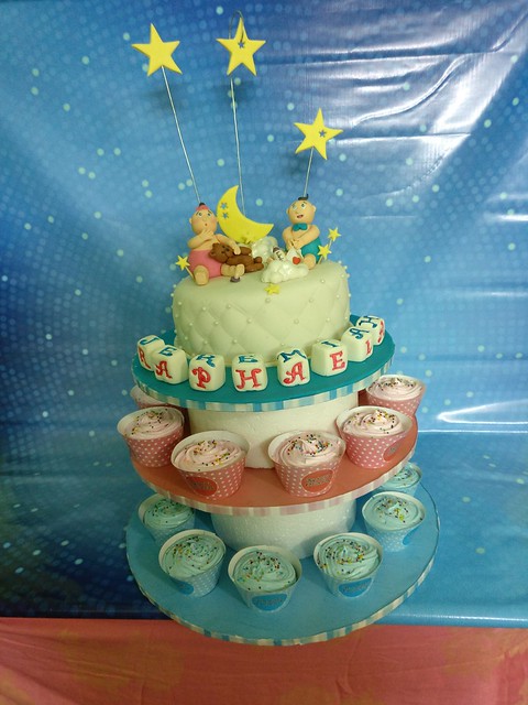 A Joint Christening Cake by Sabrina's Cakery