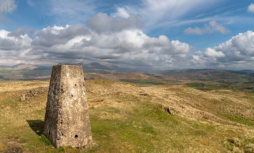 greatburney hill fell mountain lakeland lakes lake district coniston furness oldman water trigpoint cairn concrete typical old weathered landscape south cumbria cumbrian england english uk britain british upland grazing farming farm common