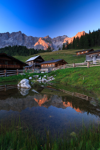 ramsauamdachstein steiermark austria styria alps alpine mountains ramsau neustattalm alm house wooden traditional sunset dachstein water reflection