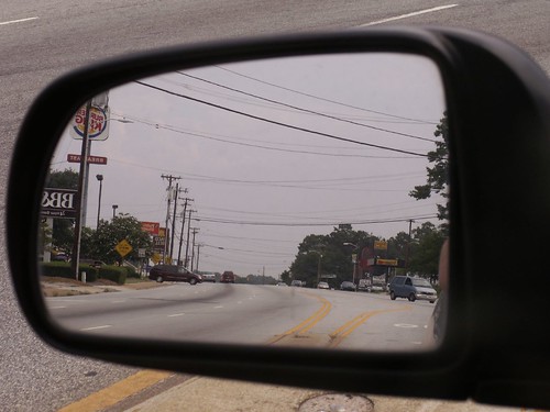 reflection mirror driving traffic suburban fastfood suburbia behind rearview sprawl dimage blight konicaminolta z6 dimagez6 konicaminoltadimagez6 konicaminoltadimage konicaminoltaz6