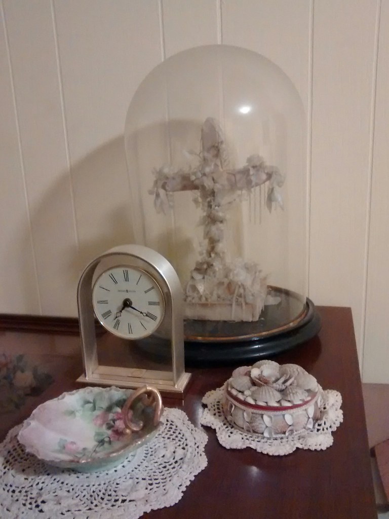 CHMC clock, waxed cross under glass hood, sea shell circular box, ceramic dish