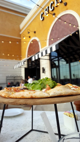 pizza al fresco. From Why You Need to Try Bravo Cucina Italiana's Spring Promotion