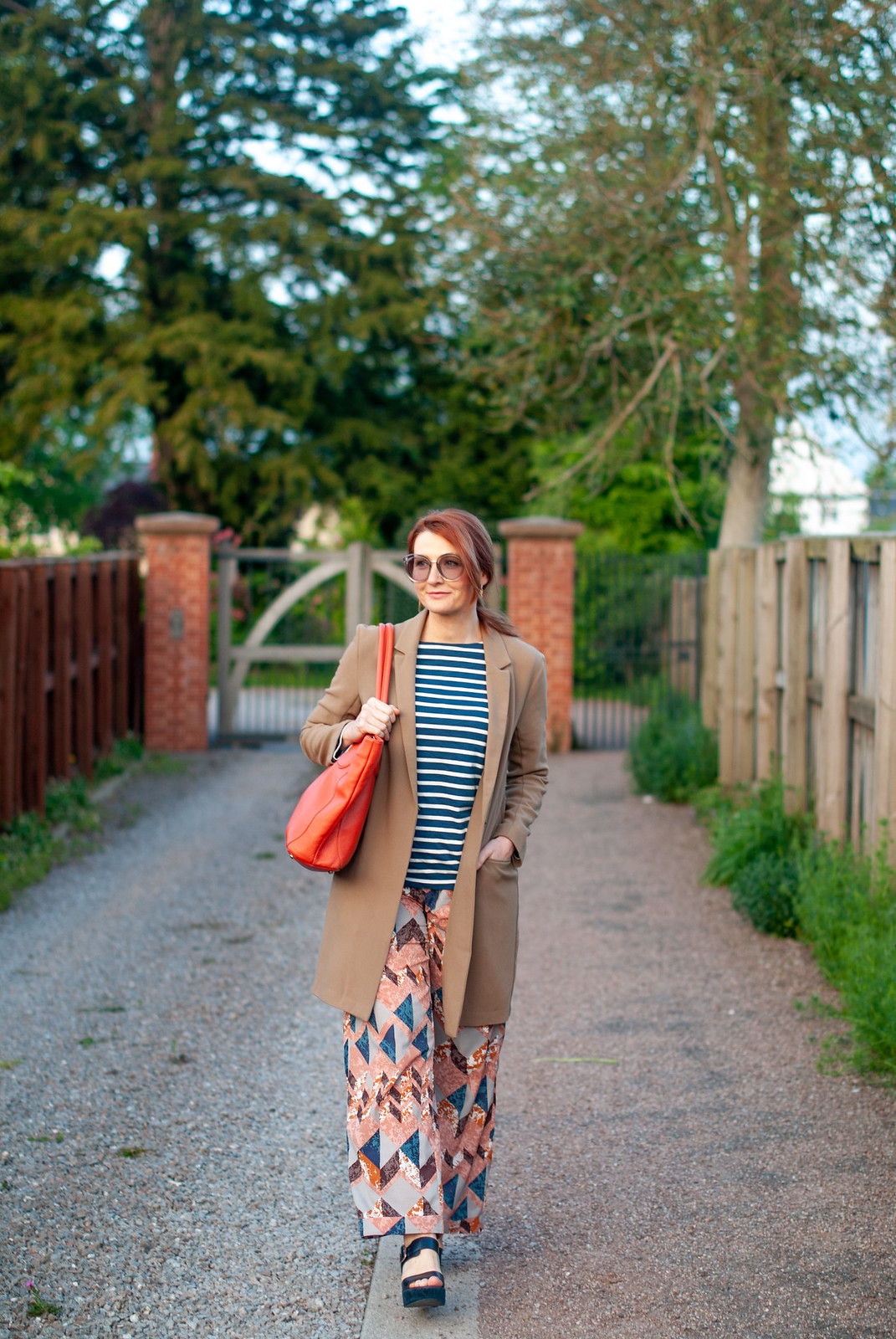 How to Create a Stylish Look With Loose-Fitting Pieces: Longline camel blazer \ navy stripe Breton top \ patterned wide leg trousers pants | Not Dressed As Lamb, over 40 style