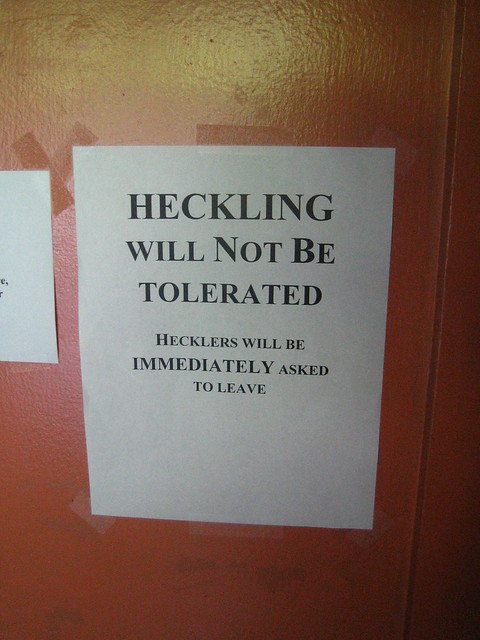 heckling will not be tolerated sign