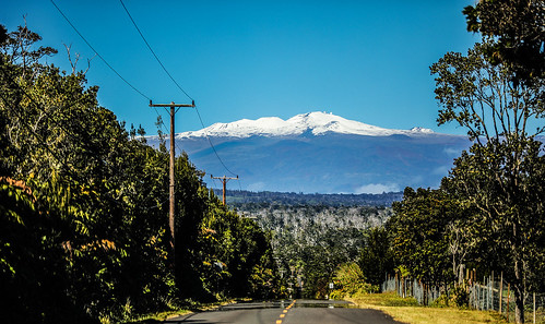 hawaii bigisland maunakea whitemountain volcano snowcapped snow poli’ahu kapu astronomicalobservatories village volcanovillage road highway powerline fence wyojones np