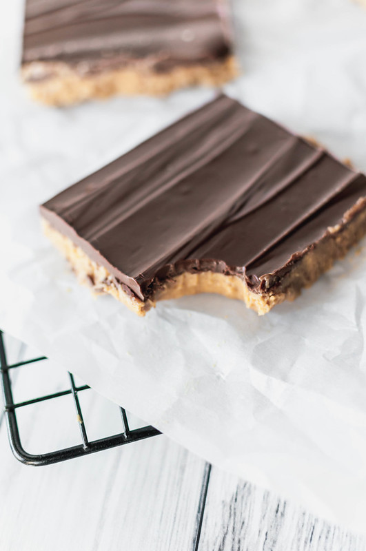 Chocolate Peanut Butter Bars are one of the easiest and most delicious desserts around. Just a handful of ingredients and you're on you way to dessert bliss.