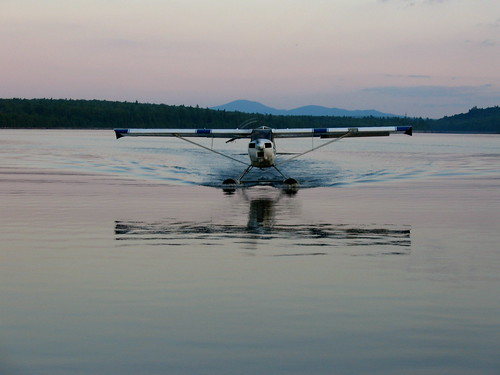 sunset lake water airplane maine floatplane brassua